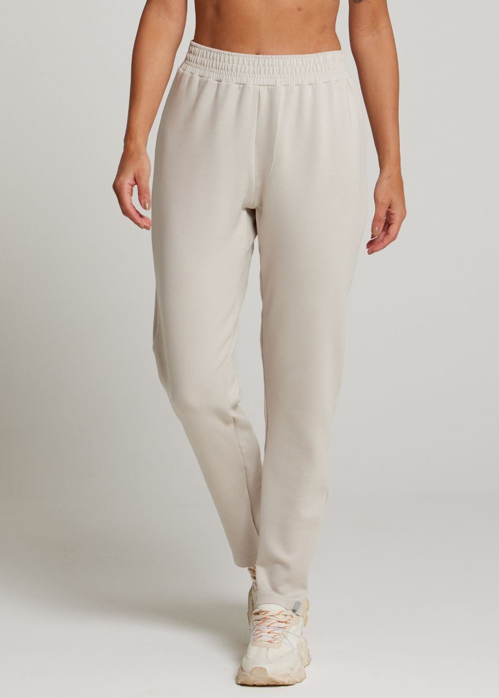 CALÇA RUNNER BEGE